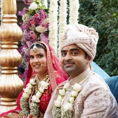 A beautiful, candid moment of the happy couple, Priyanka and Ashish, during their wedding ceremony. We believe in creating a backdrop so perfect that the couple's joy naturally becomes the centerpiece of the day.
