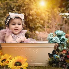 Another angle from the outdoor floral tub shoot, showing how the sunlight filters through the trees to create a magical, glowing effect.