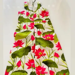 A vibrant and playful halter-neck jumpsuit for kids, featuring our limited edition lotus floral print. Made from breathable fabric, this piece is perfect for daily wear, combining a unique design with easy movement for all their adventures.