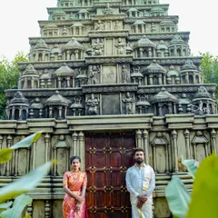 A magnificent temple gopuram replica serves as a grand and spiritual backdrop, ideal for traditional photoshoots, adding a sense of heritage and scale.