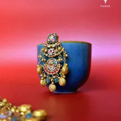 With intricate meenakari design and opulent motifs, these gold earrings are a celebration of craftsmanship and culture. Every detail is designed to add a 'jhanak' to your style.