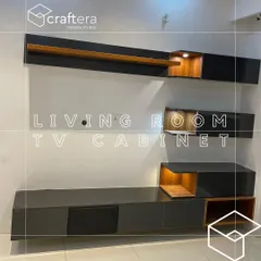 This sleek, floating TV cabinet in a dark laminate finish is perfect for a modern living room. The open wooden shelves with built-in spotlights are ideal for displaying decor, adding warmth and personality to the unit.
