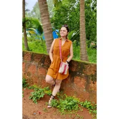 This sleeveless shirtdress in a comfortable, breathable fabric is perfect for exploring a tropical destination. The tie-waist adds definition, and it can be dressed up or down with different shoes and accessories.