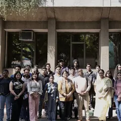 A group photograph of students and faculty with guest speaker Mr. Pawan Kumar after an engaging session on Brand Management. This shows the collaborative learning environment we foster.