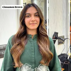 The happy client reveal. This Cinnamon Brown color frames her face beautifully and gives her hair a healthy, vibrant look.