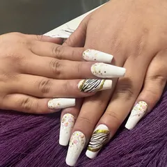 Another look at this popular white and zebra print combination on long coffin nails.