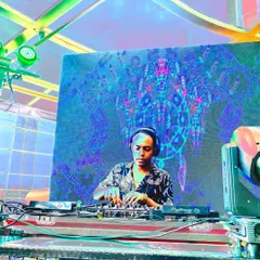 Performing with a backdrop of psychedelic visuals. My techno sets are often paired with immersive lighting and visuals to create a complete sensory experience.