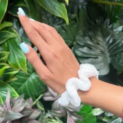 My classic white velvet scrunchie, a versatile accessory that goes with any outfit. It’s soft, stretchy, and handmade to be durable.