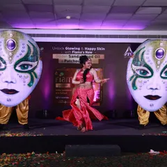 We love using larger-than-life props to make a statement. Here, a solo performer is flanked by two dancers in giant, ornate mask costumes for an ITC Fiama product launch, demonstrating our ability to create unique, branded entertainment.
