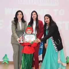 Celebrating our little elf's wonderful performance. Every child is a star on our stage, and we love to honor their hard work with certificates and trophies at our Christmas theatre events.