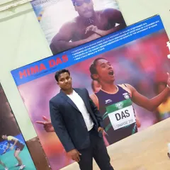 I believe you must work hard until you become an inspiration to others. Standing next to this poster of myself is a reminder of my own journey and the path I help my students follow.