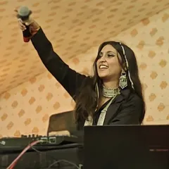 Raising the energy with the crowd. A great Garba night is a conversation between the DJ and the dancers, and I make sure we're all on the same wavelength.