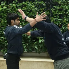 Here, I am teaching a basic block and redirect technique. The goal in Krav Maga is to end a confrontation as quickly as possible by deflecting an attack and creating an opening for a counter-move.