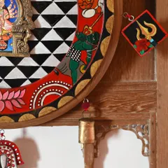 A close-up of the Durga frame, showing the intricate details of the hand-painted border and the found-object trims. This piece tells the story of the goddess and her liberation of the demon Mahisasura.