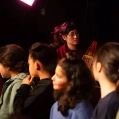 A performance from our musical tale 'Pajarillo Verde' in France. This project, centered on the theme of adoption, involved collaborating with local students.