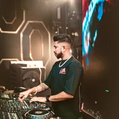 A close-up of me working the Pioneer DJ console at Glitte. This highlights the technical skill and precision that goes into every mix.