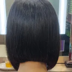 Another view of this flawless bob. The hair falls perfectly into place, showcasing the quality of the cut and the healthy, natural shine of the hair.