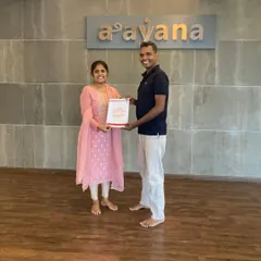 Our founder, Regeesh, presents a certificate to a new teacher. We believe teachers have three loves: love of learning, love for learners, and the love of bringing the two together.