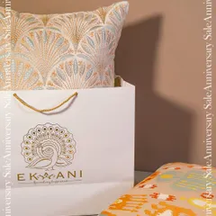 My biggest home decor sale is loading. This image, featuring a cushion in a gift bag, is a teaser for the exclusive deals on luxury home decor that will transform your space with elegance and style.