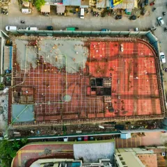 Our drone photography services offer a top-down perspective for large-scale projects. This aerial shot documents the slab work of a construction site in Mumbai, providing a clear and detailed progress report for real estate and development clients.