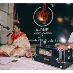 A student performs a traditional song, accompanied by a harmonium player, during one of our in-house music showcases. These smaller events provide regular practice for the big stage.