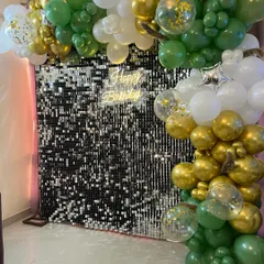 A closer look at the silver sequin wall and the detailed balloon work.