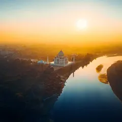 An aerial view of the Taj Mahal at sunrise, captured with my drone. This shot emphasizes the monument's perfect symmetry and its serene location on the banks of the Yamuna.