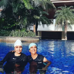 The friendships formed in my classes are just as important as the fitness gains. Here are two members enjoying a moment together in the pool.