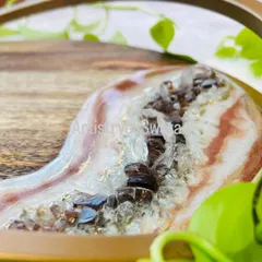 A close-up of the geode detailing on the wooden tray. I use real crystals to create this beautiful, natural texture that blends seamlessly with the wood.