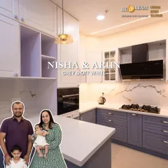 We designed this modern grey and off-white kitchen for Nisha and Arun's family. It was a joy to create a functional and stylish space for them to make memories together.