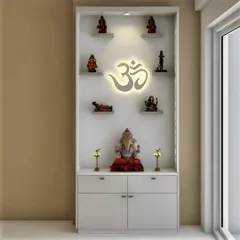 A compact and minimalist wall-mounted pooja unit in a clean white finish. The backlit 'Om' creates a serene glow, and the open shelves and lower drawers offer space for idols and supplies.