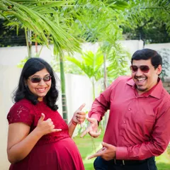 We encourage couples to have fun and be themselves during our maternity sessions. This playful shot captures the happy and relaxed dynamic between the parents-to-be.