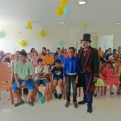 Posing with the birthday boy and his friends. It's great to see the kids still buzzing with excitement after the magic show has ended.