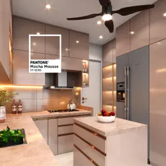 A beautiful example of a kitchen designed in the warm, trending "Mocha Mousse" color. The glossy cabinets, marble-look countertop, and island create a luxurious and inviting cooking space.