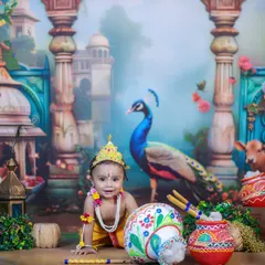 This curious Little Krishna is crawling towards a pot of butter (makhan). The detailed backdrop of Vrindavan and props like the flute create a complete story.