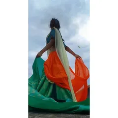 For my Independence Day shoot, I used the flow and drape of different colored fabrics to represent the Indian flag. This shot captures the movement and spirit of the concept.
