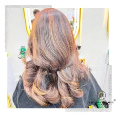 Look at the rich dimension in this hair color. By blending different tones of brown and caramel, I created a multi-dimensional look that appears full of life and movement.