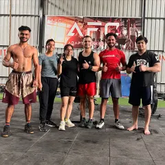 Sweat, smiles, and thumbs up all around. This is the feeling of accomplishment after a great group session.