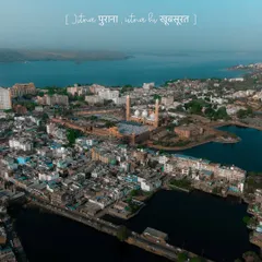 The city of lakes, Bhopal, seen from above. This drone shot captures the unique layout of the old city nestled between the water bodies that give it its name.