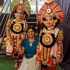 Posing with my young students dressed in elaborate Yakshagana-style costumes for our performance at the Karavali Utsava. We love incorporating folk elements into our choreography.