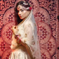 Moments from our Heeramandi-inspired shoot. These images showcase the intricate details of the makeup, hair, and styling, capturing the mood and opulence of the era.