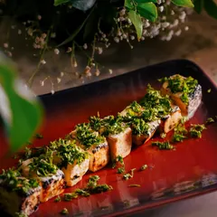 This is my Paneer Ajamod Tikka, a unique dish where paneer is grilled and topped with a generous amount of fresh, herby ajamod (celery). It's a fresh and aromatic take on paneer tikka.