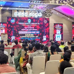 I can manage large-scale awards nights and corporate functions, like this "Sandalwood Stars Night". The setup included a large LED backdrop, professional stage lighting, and seating arrangements for a large audience, ensuring the entire event ran smoothly.