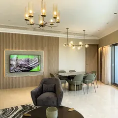 In this apartment at Lodha World One, I embraced the Art Deco style. The space is brought to life with classical elements, contemporary touches, and an abundance of Swarovski lighting that blends perfectly with the chosen colors and textures.