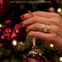 A quiet statement, made threefold. This unique ring features three pear-shaped emeralds entwined in a graceful cluster, each surrounded by a halo of shimmering diamonds for a look of sophisticated sparkle.