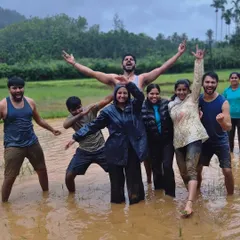 Pure, unadulterated joy! Our group having a blast playing "kesaru gadde" (mud games) in the paddy fields of Samse.