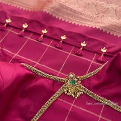 The back of a magenta blouse, showing the unique neckline and tassels. While the body may be silk, the velvet sleeves in other designs show my love for the fabric.