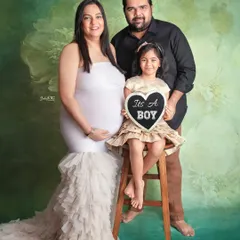 The whole family is ready to welcome a baby boy. It's so special to capture the excitement of an older sibling during a family maternity session.