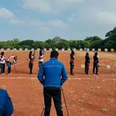 A view from behind the shooting line, watching our archers compete at the state level. My role as a coach is to observe and provide support during these high-pressure moments.