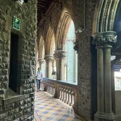 The beautiful and imposing architecture of a court corridor. These halls have witnessed countless legal battles and journeys for justice.